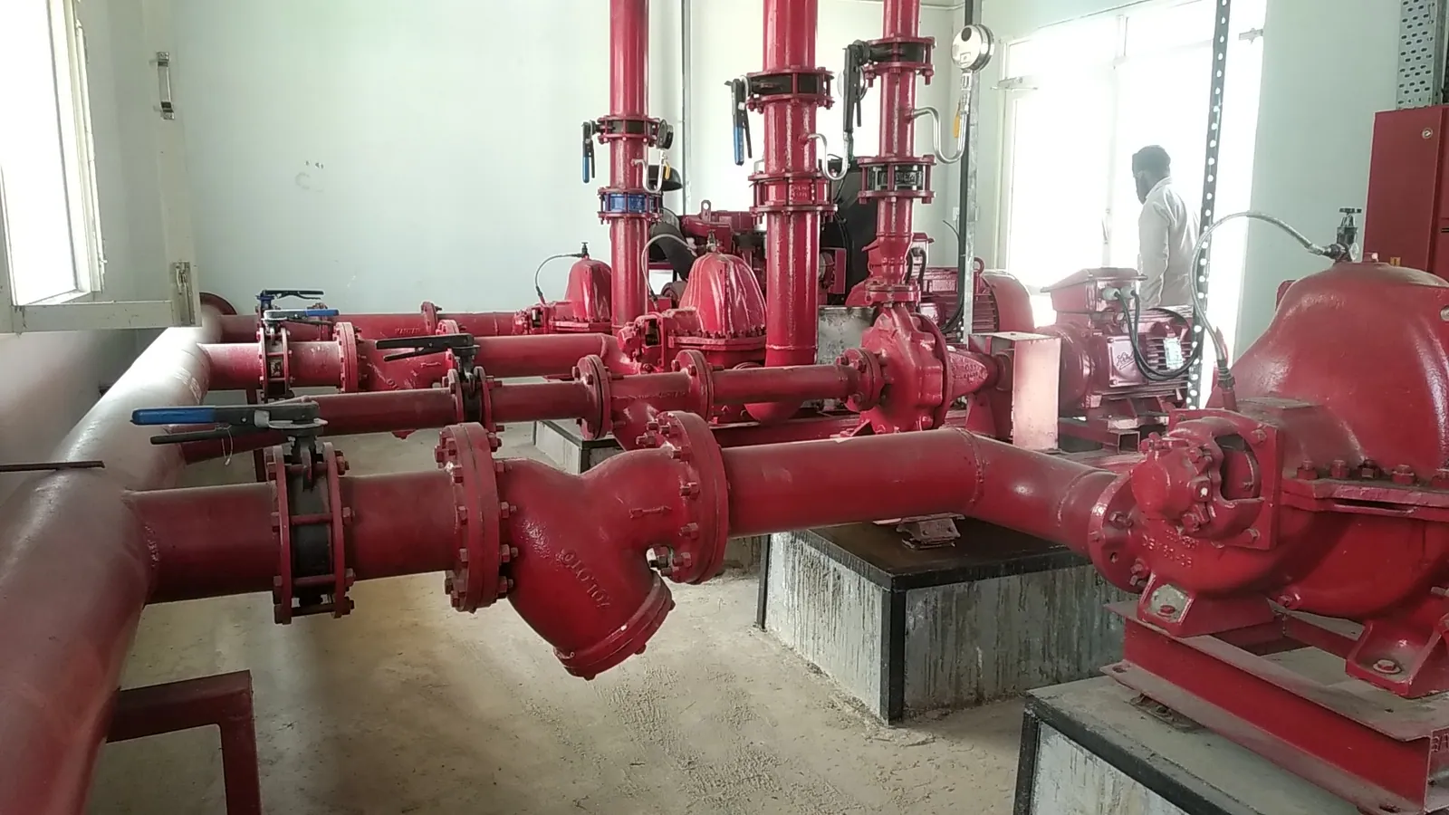 Fire-water pump piping with valves, flanges and strainers
