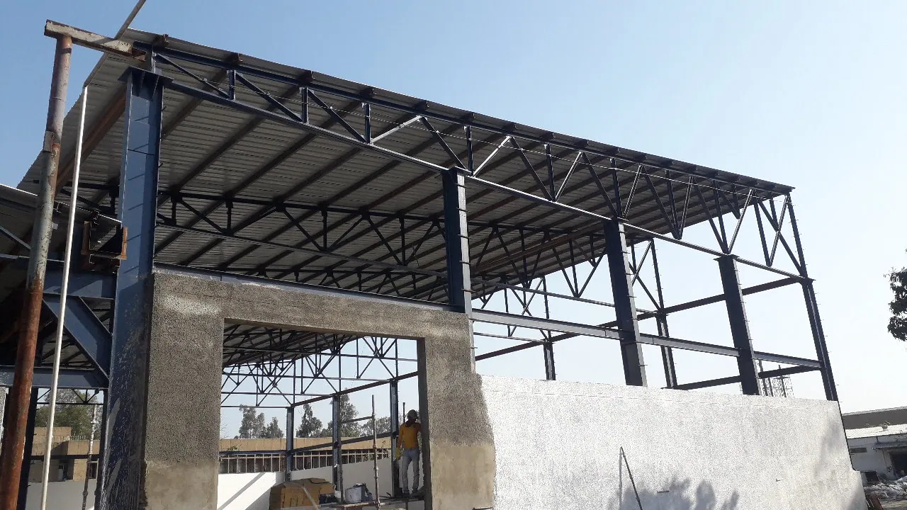 Industrial steel shed structure with roof sheets installed