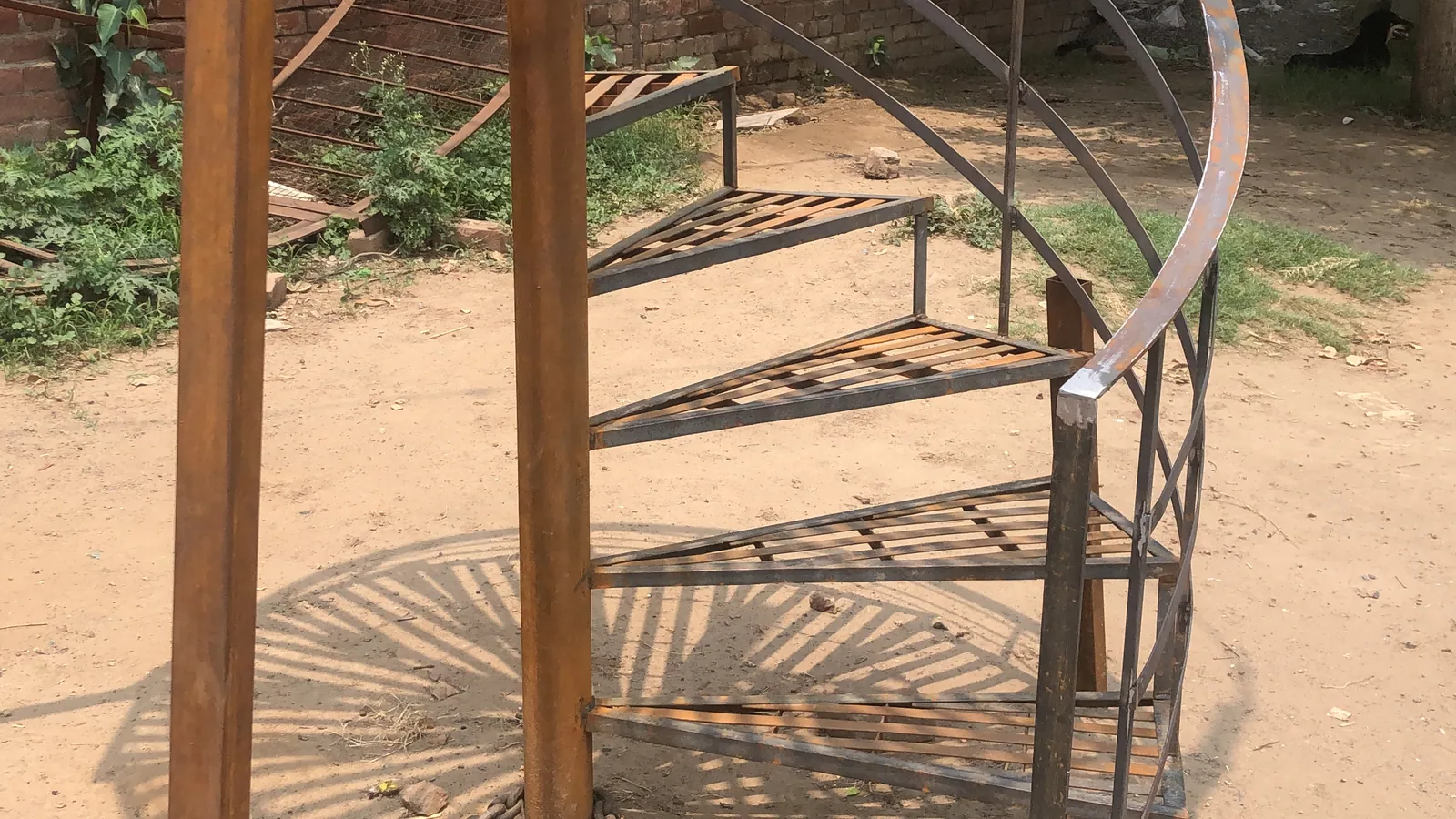 Fabricated mild steel spiral staircase with triangular treads