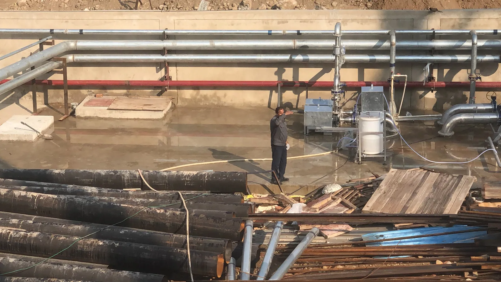 Industrial water pipeline network installed across a plant utility area
